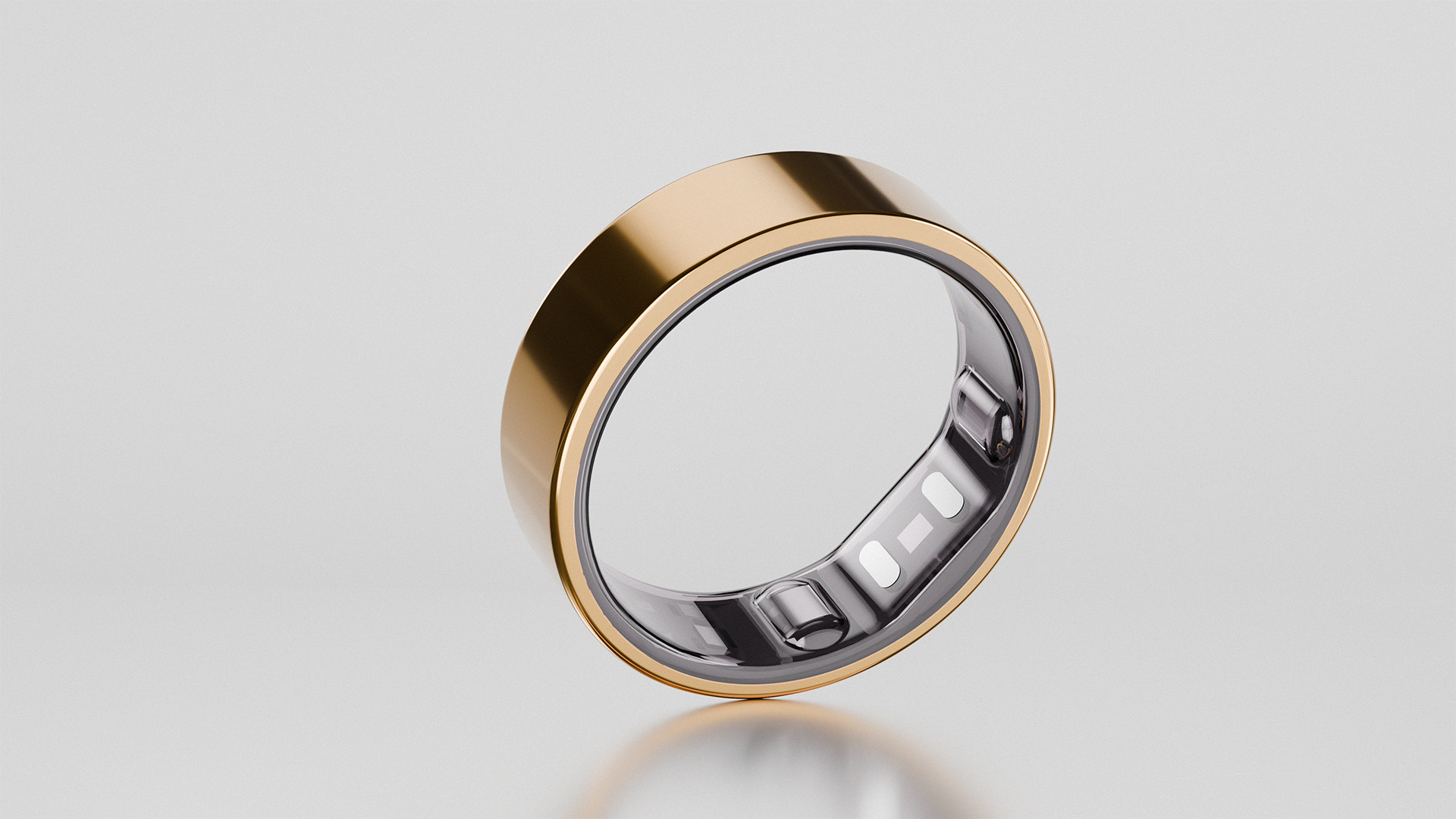 Gold Reebok Smart Ring 3D render with reflective glass material