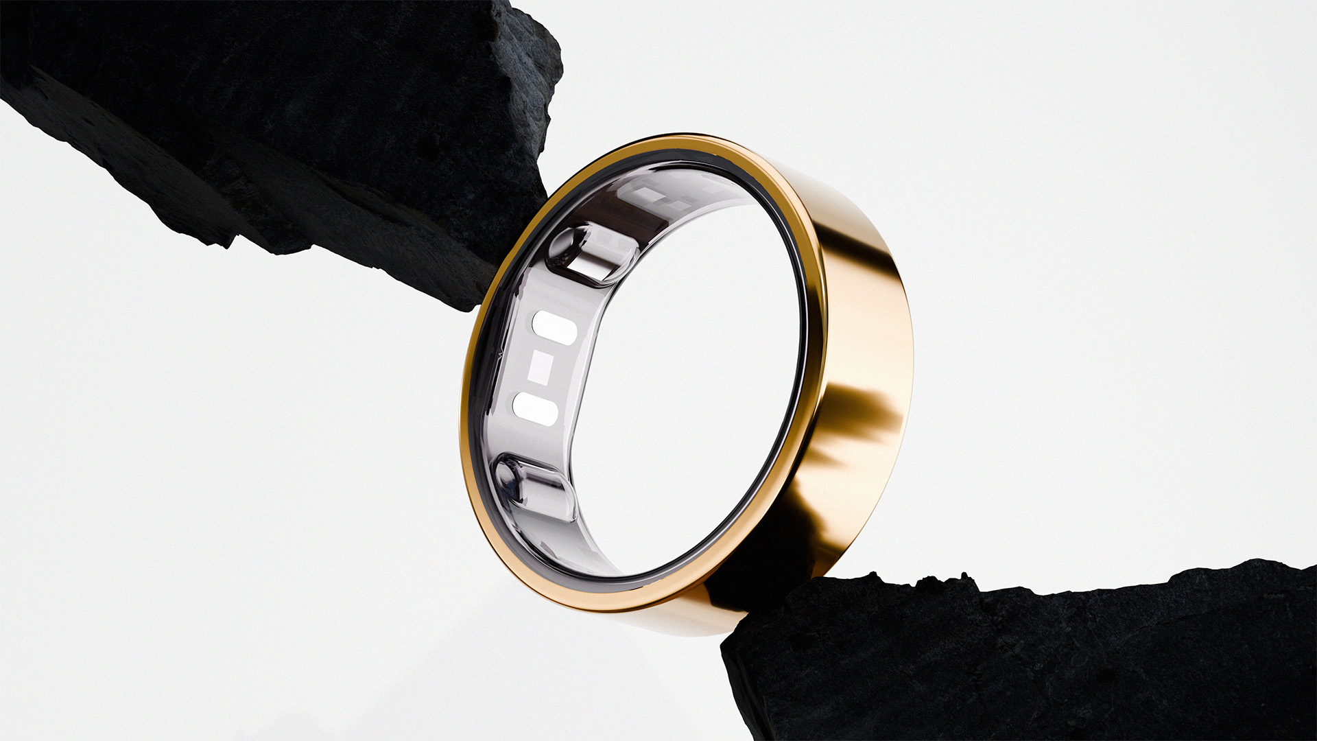 Gold Reebok Smart Ring 3D render between stone elements